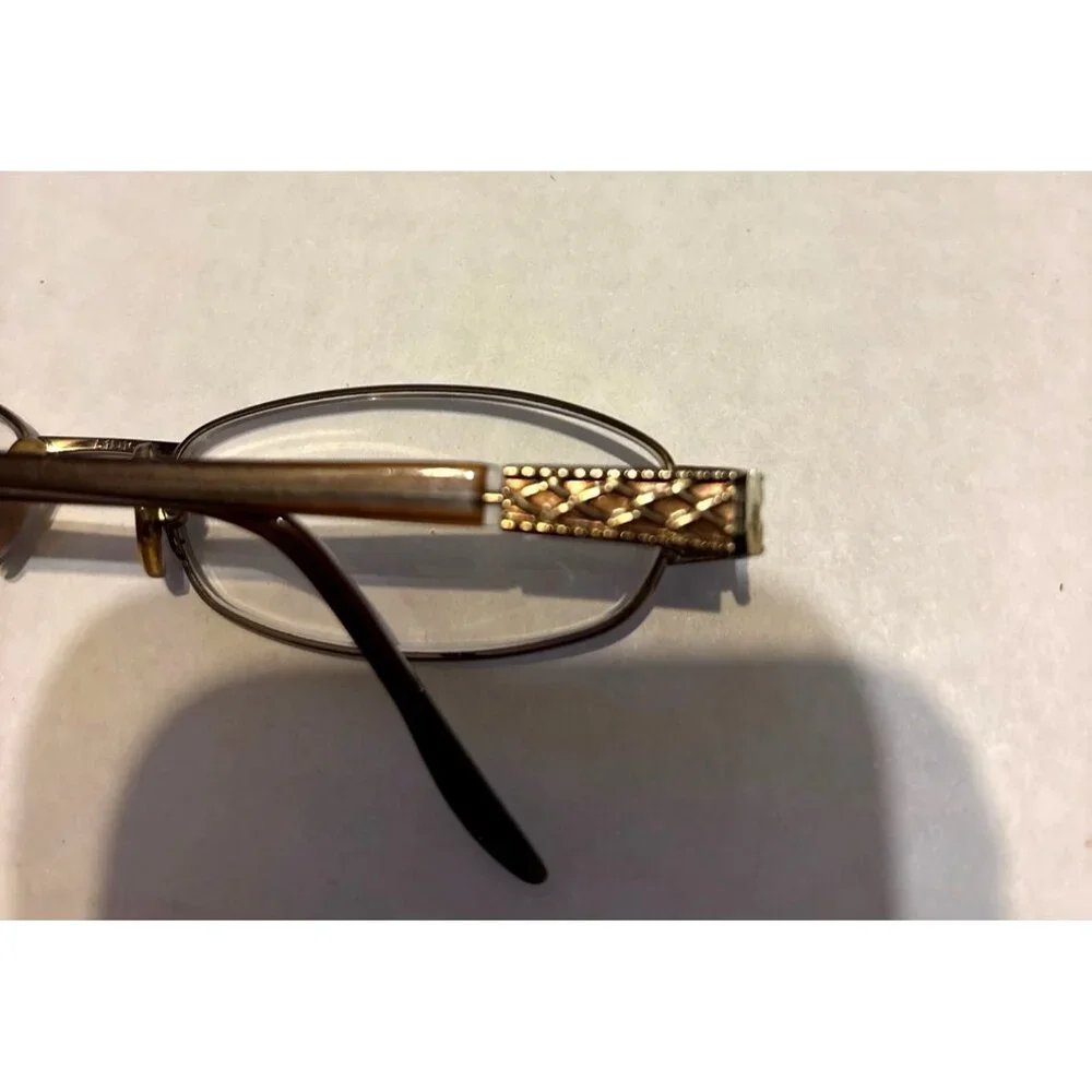 Vtg Marchon Oval Gold-Tone Eyeglasses With Intricate Side Details Frames only